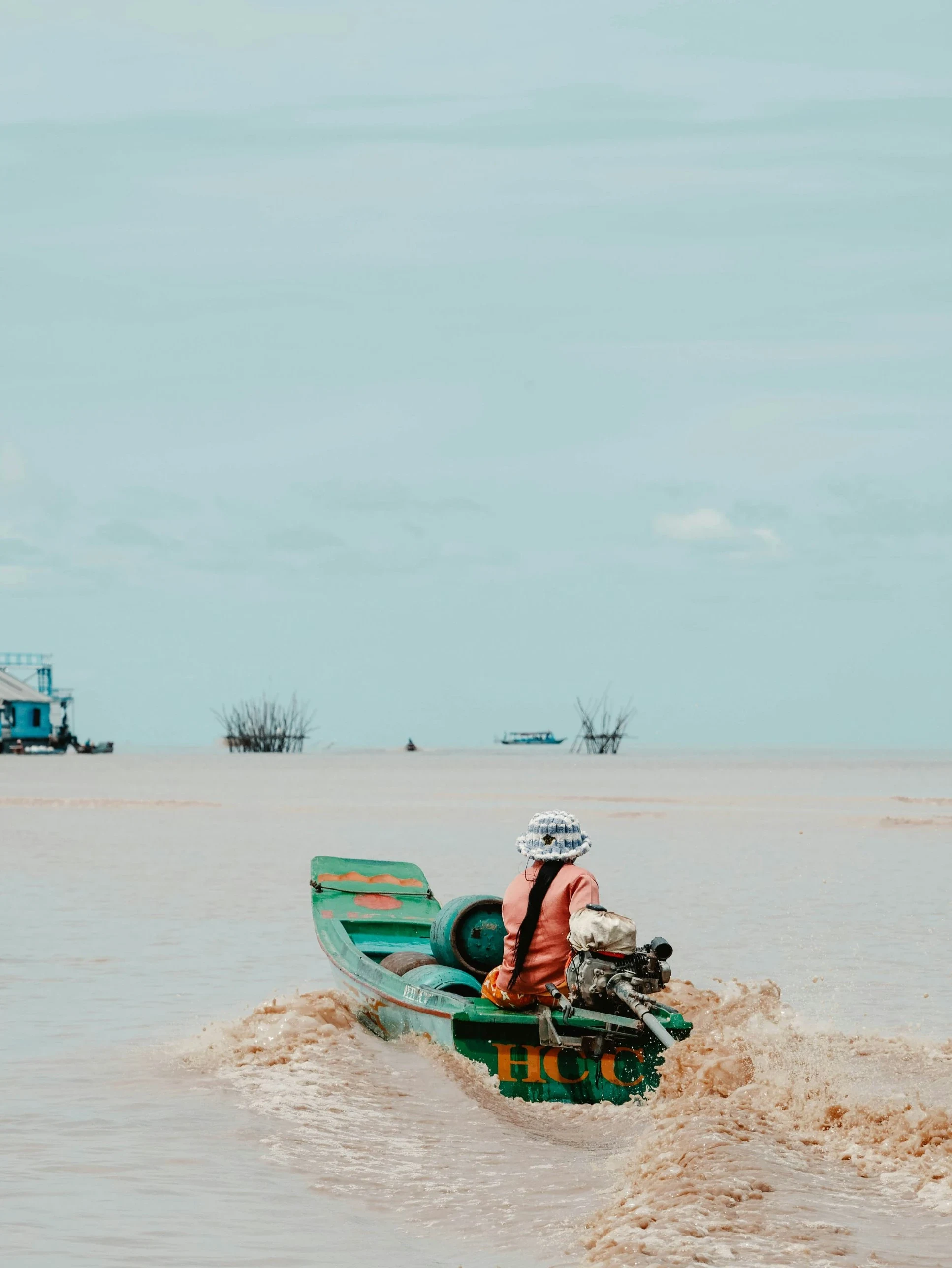 A boat heading out across Tonle Sap Lake